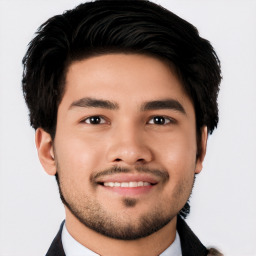 Joyful white young-adult male with short  black hair and brown eyes