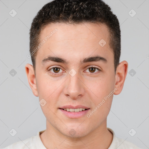 Joyful white young-adult male with short  brown hair and brown eyes