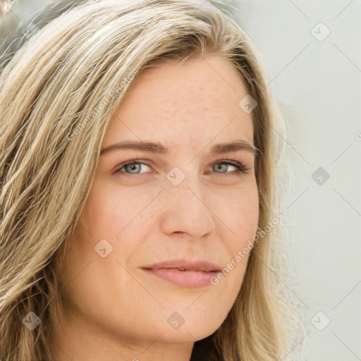 Joyful white young-adult female with long  brown hair and green eyes