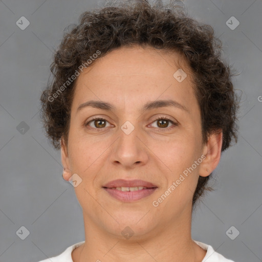 Joyful white adult female with short  brown hair and brown eyes