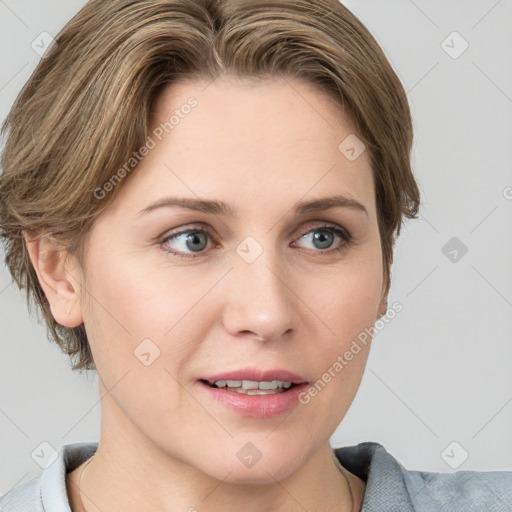 Joyful white young-adult female with short  brown hair and blue eyes