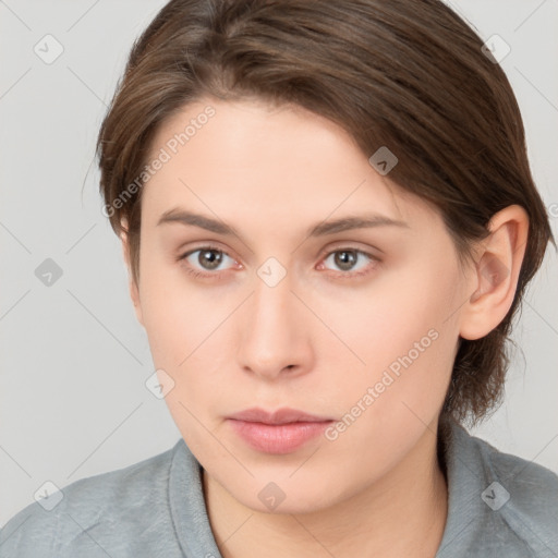 Neutral white young-adult female with medium  brown hair and grey eyes