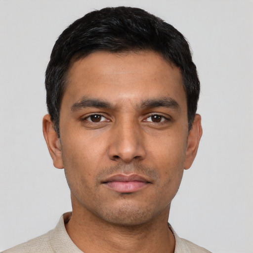 Neutral latino young-adult male with short  black hair and brown eyes
