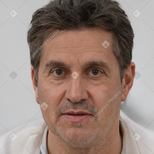 Joyful white middle-aged male with short  brown hair and brown eyes