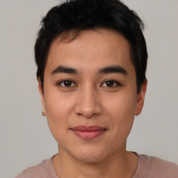 Joyful asian young-adult male with short  brown hair and brown eyes