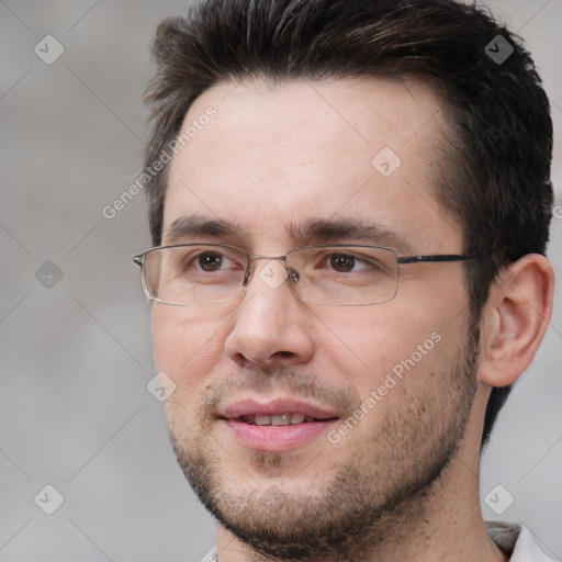 Joyful white adult male with short  brown hair and brown eyes