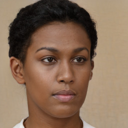 Neutral black young-adult female with short  brown hair and brown eyes