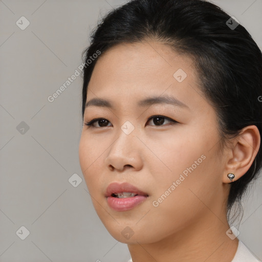 Neutral asian young-adult female with medium  brown hair and brown eyes