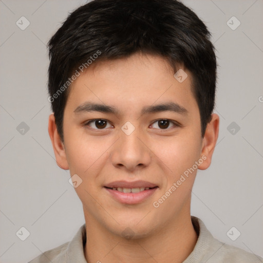 Joyful asian young-adult male with short  brown hair and brown eyes