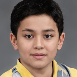 Joyful white child male with short  brown hair and brown eyes