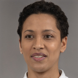Joyful white adult female with short  brown hair and brown eyes