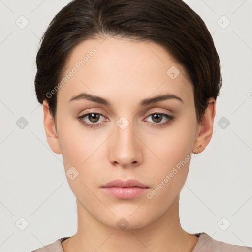 Neutral white young-adult female with short  brown hair and brown eyes