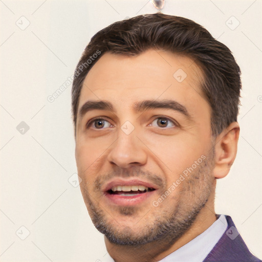 Joyful white young-adult male with short  black hair and brown eyes