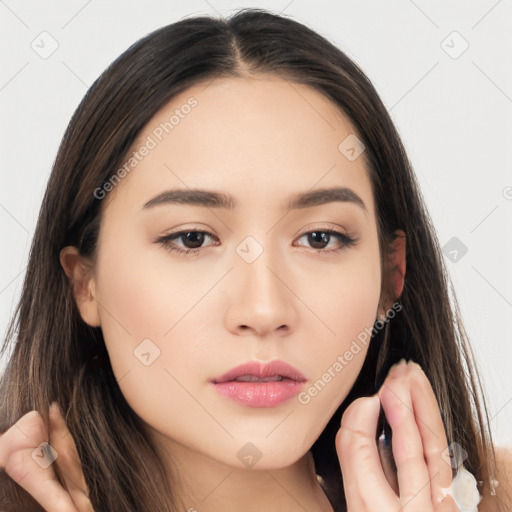 Neutral white young-adult female with long  brown hair and brown eyes