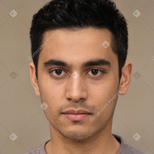 Neutral latino young-adult male with short  black hair and brown eyes