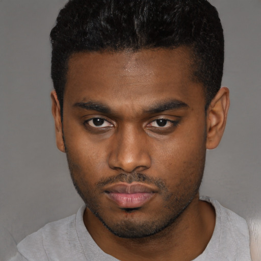 Neutral black young-adult male with short  black hair and brown eyes