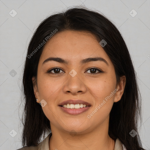 Joyful latino young-adult female with long  brown hair and brown eyes