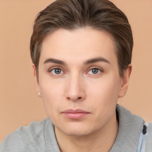 Neutral white young-adult male with short  brown hair and brown eyes