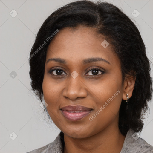 Joyful black young-adult female with medium  black hair and brown eyes