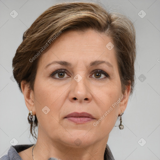 Joyful white adult female with short  brown hair and grey eyes