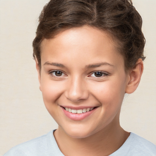 Joyful white child female with short  brown hair and brown eyes