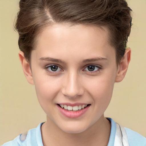 Joyful white child female with short  brown hair and brown eyes