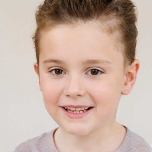 Joyful white child male with short  brown hair and brown eyes