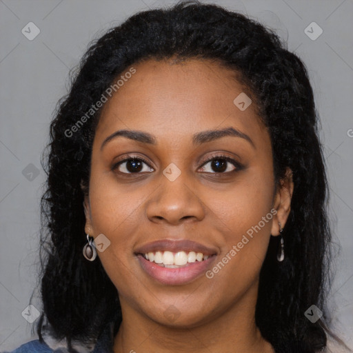 Joyful latino young-adult female with long  black hair and brown eyes