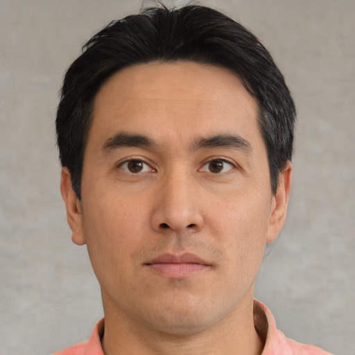 Neutral asian young-adult male with short  brown hair and brown eyes