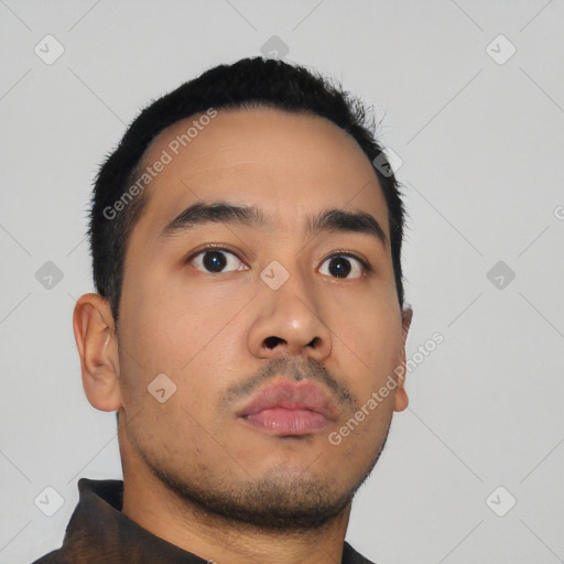 Neutral latino young-adult male with short  black hair and brown eyes