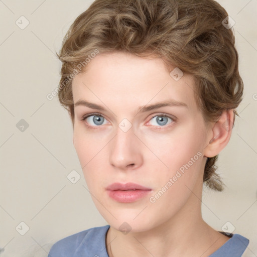 Neutral white young-adult female with medium  brown hair and grey eyes