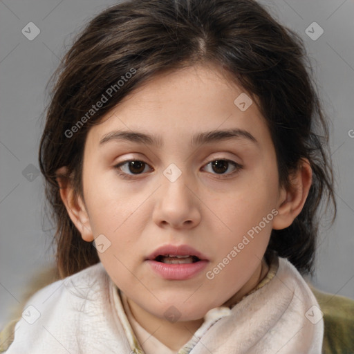 Joyful white child female with medium  brown hair and brown eyes