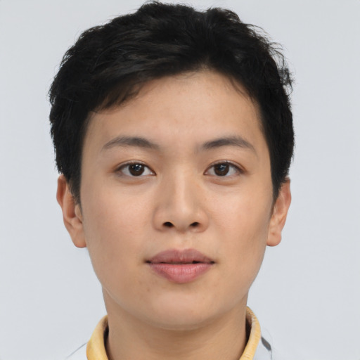 Joyful asian young-adult female with short  brown hair and brown eyes