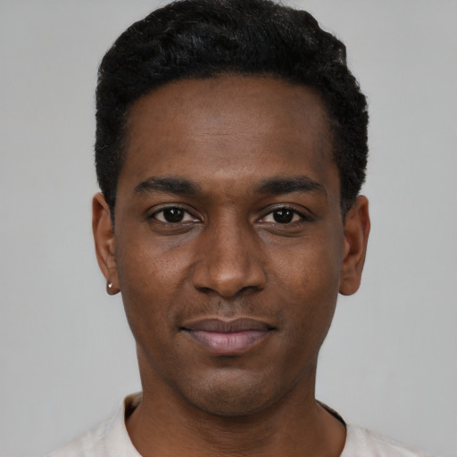 Neutral black young-adult male with short  black hair and brown eyes