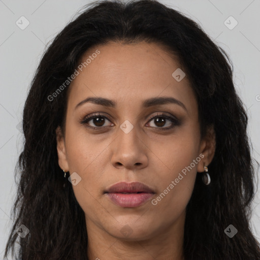 Joyful latino young-adult female with long  brown hair and brown eyes