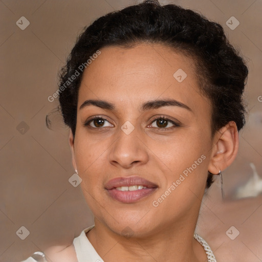 Joyful latino young-adult female with short  brown hair and brown eyes