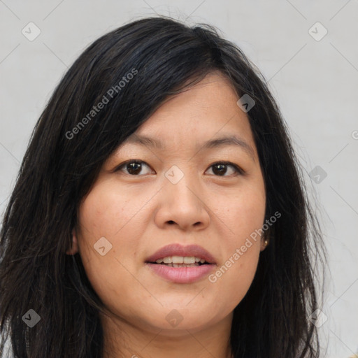 Joyful asian young-adult female with long  brown hair and brown eyes