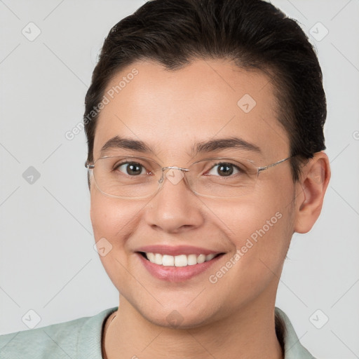 Joyful white young-adult female with short  brown hair and brown eyes