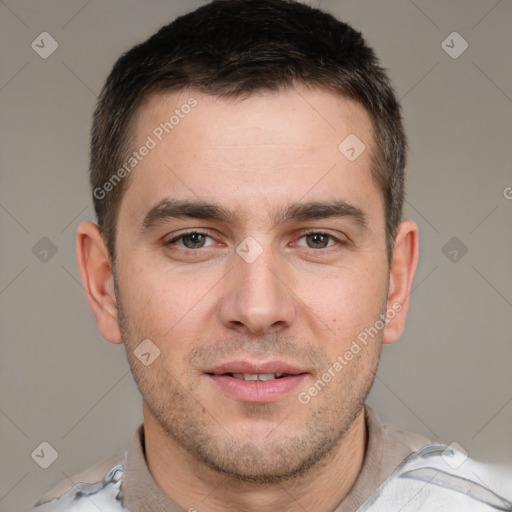 Joyful white young-adult male with short  brown hair and brown eyes