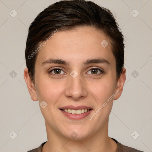 Joyful white young-adult female with short  brown hair and brown eyes