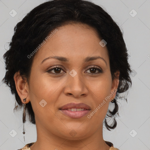 Joyful latino adult female with medium  brown hair and brown eyes