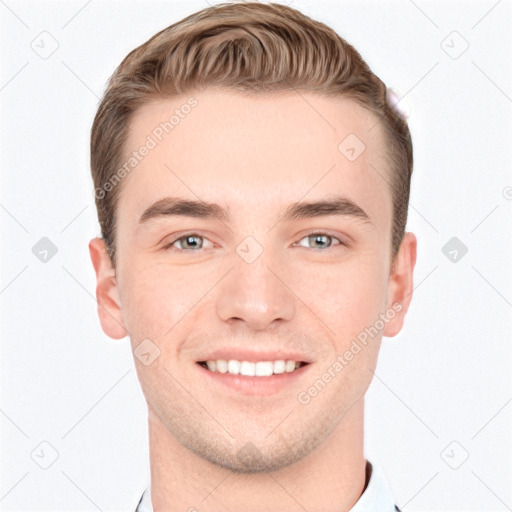 Joyful white young-adult male with short  brown hair and grey eyes