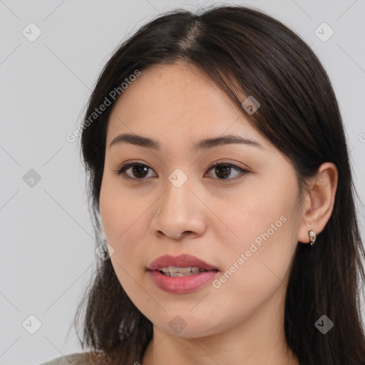 Joyful white young-adult female with long  brown hair and brown eyes