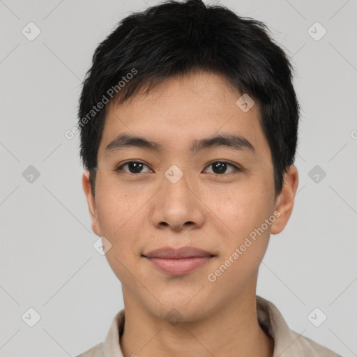 Joyful asian young-adult male with short  brown hair and brown eyes