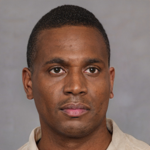 Neutral black young-adult male with short  brown hair and brown eyes