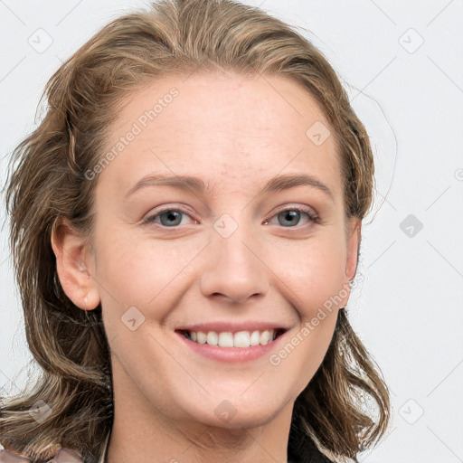 Joyful white young-adult female with long  brown hair and grey eyes