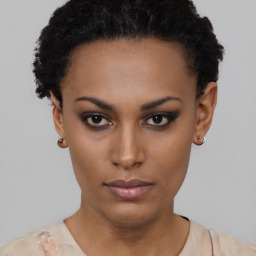 Neutral black young-adult female with short  black hair and brown eyes