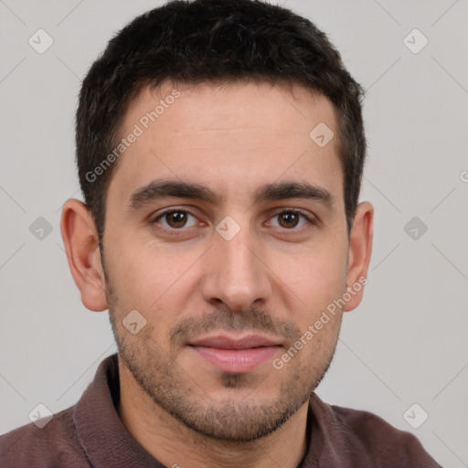 Joyful white young-adult male with short  brown hair and brown eyes