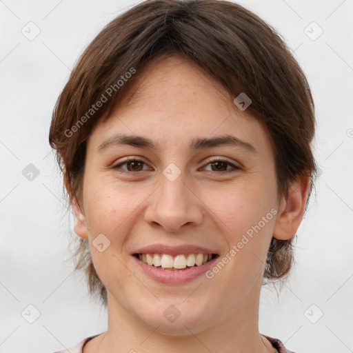 Joyful white young-adult female with medium  brown hair and brown eyes