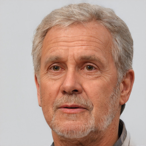 Neutral white middle-aged male with short  gray hair and brown eyes